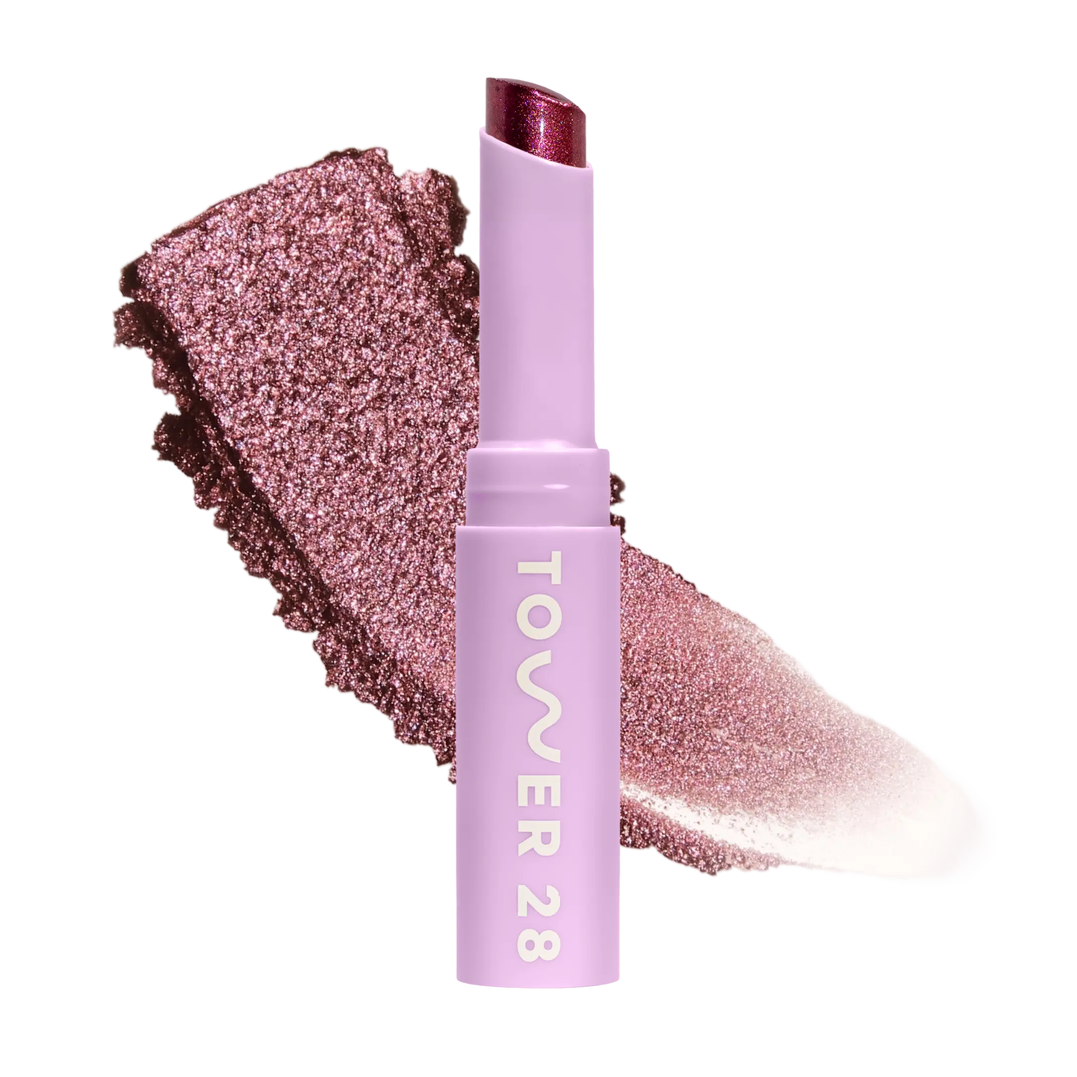 Eyeshadow with glittery texture and 'Tower 28' branding on a white background [Studio 28]