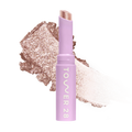 Eyeshadow with glittery texture and 'Tower 28' branding on a white background [Roxy]