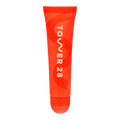 The Tower 28 Beauty LipSoftie™ Lip Treatment in the shade SOS Vanilla. [SOS Vanilla]