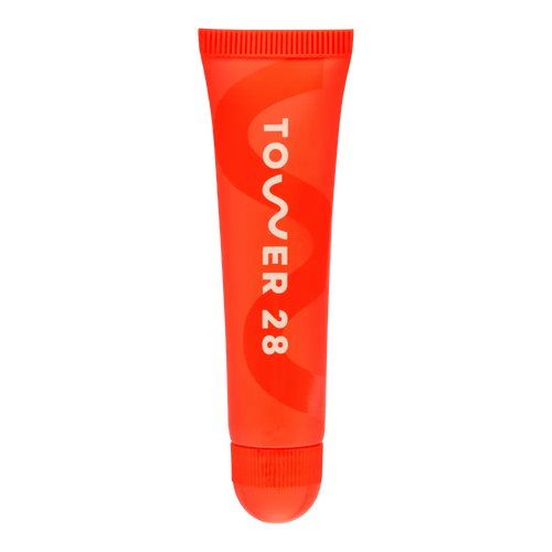 The Tower 28 Beauty LipSoftie™ Lip Treatment in the shade SOS Vanilla. [SOS Vanilla]